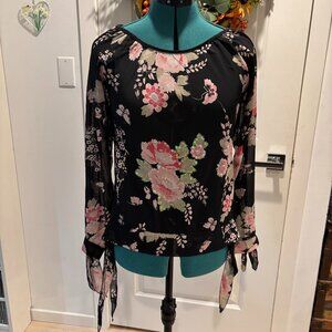 Black and pink floral blouse with paillettes decor in pink